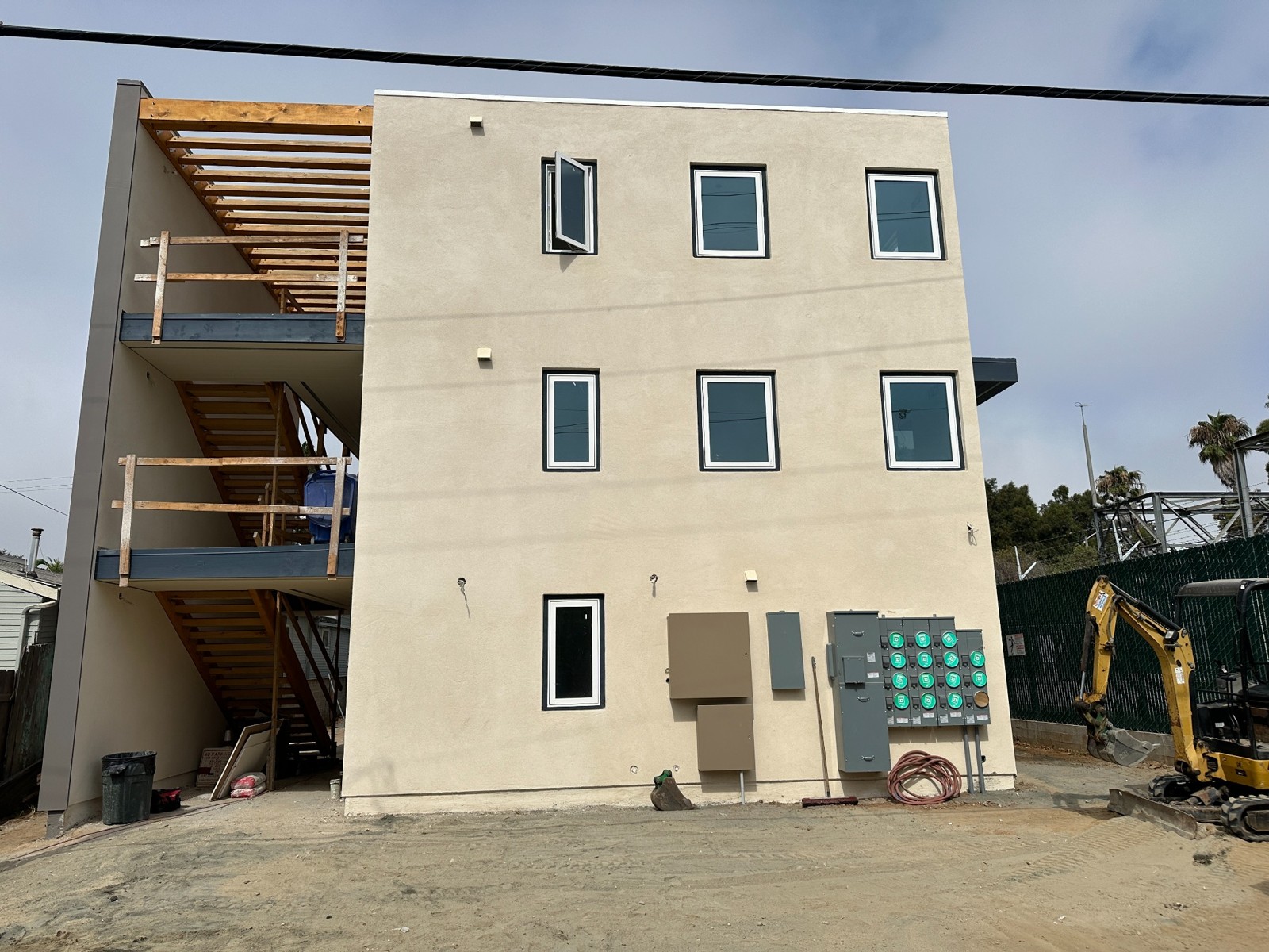 Three story Florida Street Micro Units building during construction