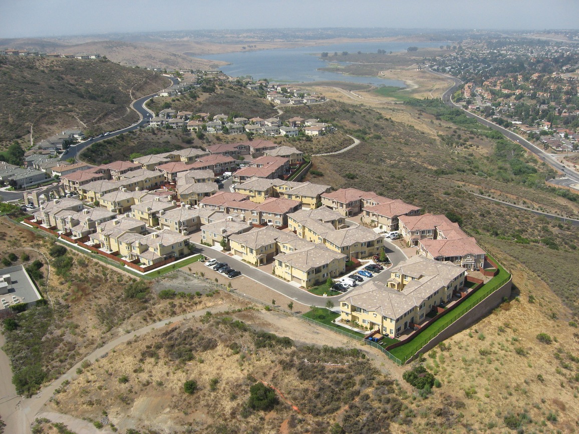 Aerial view of completed Jackson Pointe buildings overlooking the lake