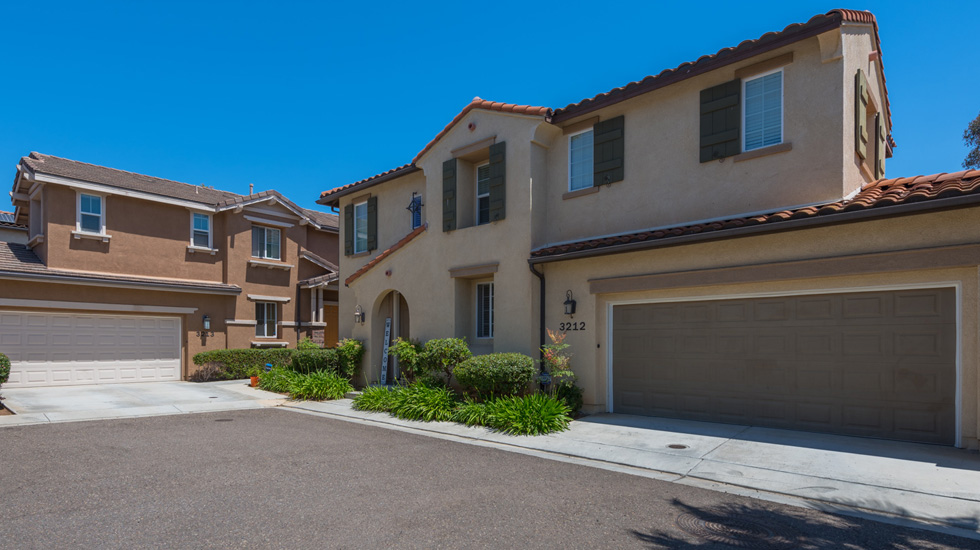 Two story detached homes and landscaping at Mirabelle